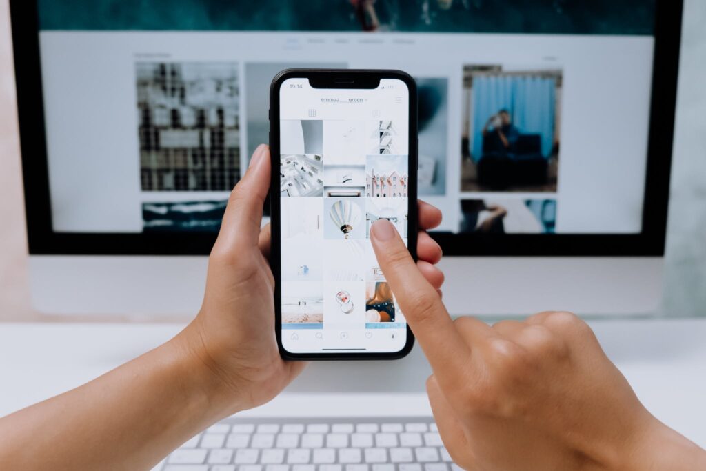 Person Using a Smartphone getting a website to sell quickly